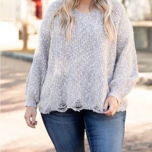 Purple and white sweater